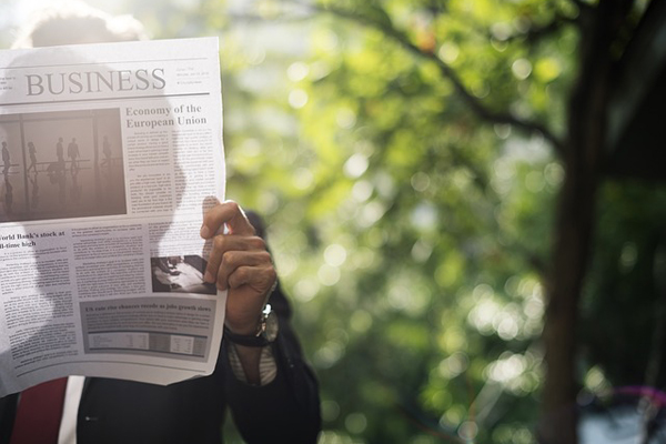 Man reading newspaper