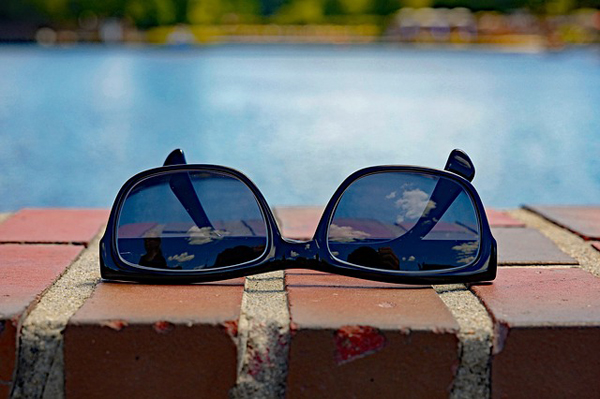 Sunglasses by water