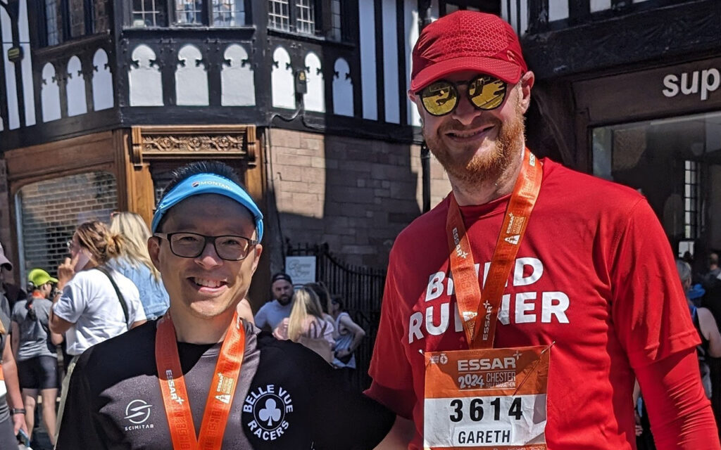 Phil and gareth smiling at the Chester Half Marathon